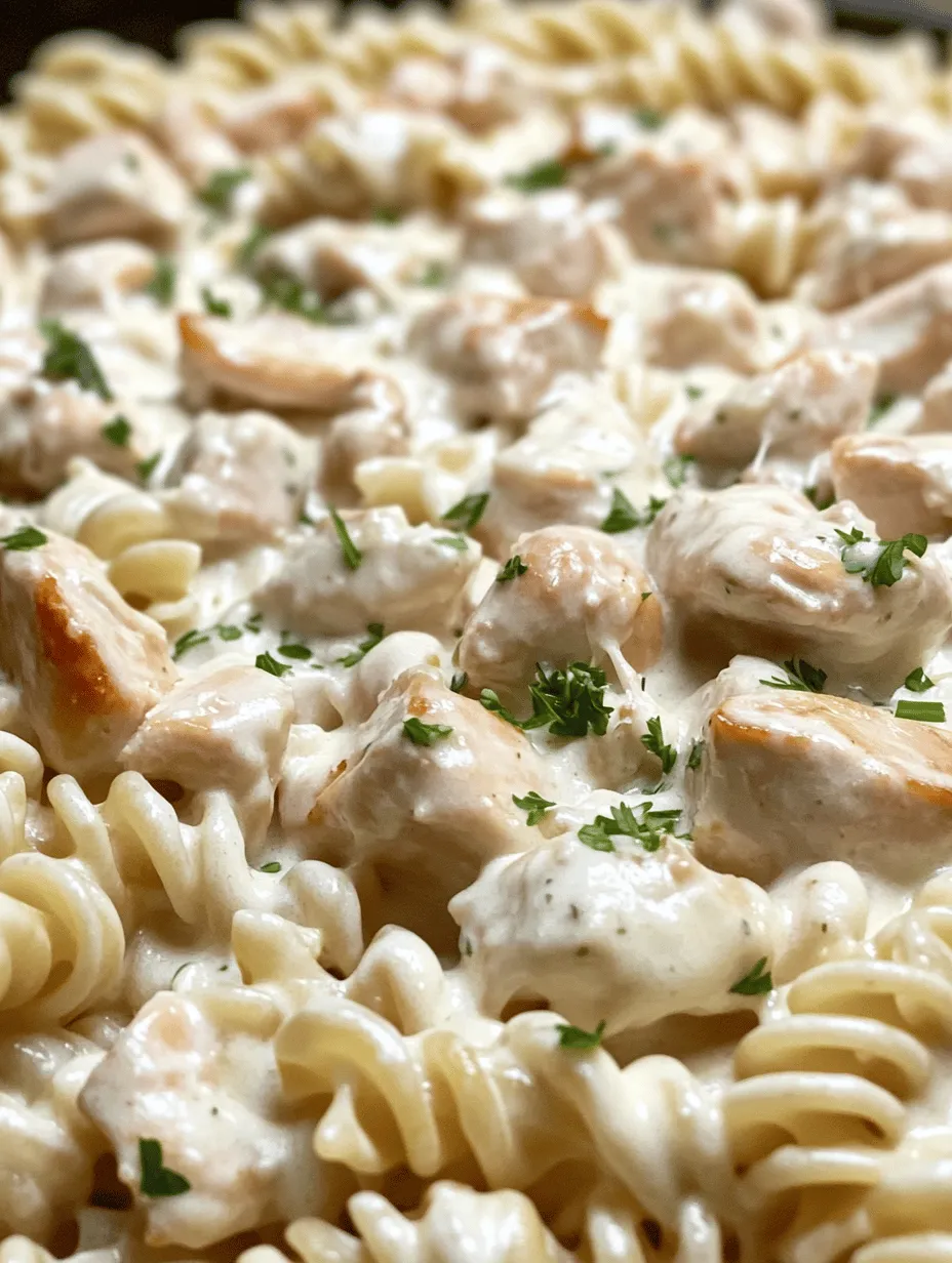 Welcome to the delicious world of Creamy Garlic Butter Chicken & Rotini in Parmesan Sauce, a dish that tantalizes your taste buds and warms your heart. This recipe is a delightful blend of tender chicken, al dente rotini pasta, and a rich, creamy sauce that makes each bite feel like a comforting hug. The combination of flavors and textures in this dish creates a symphony of satisfaction, making it an ideal choice for both a quick weeknight dinner and a special occasion.